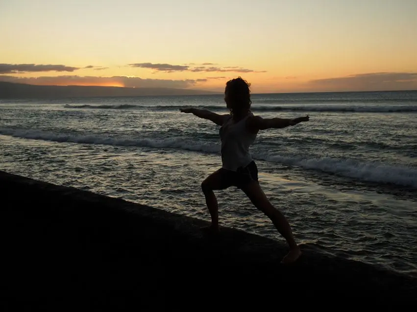 Warriors pose. We have 4 eco-friendly yoga mats so you can leave your mat at home!